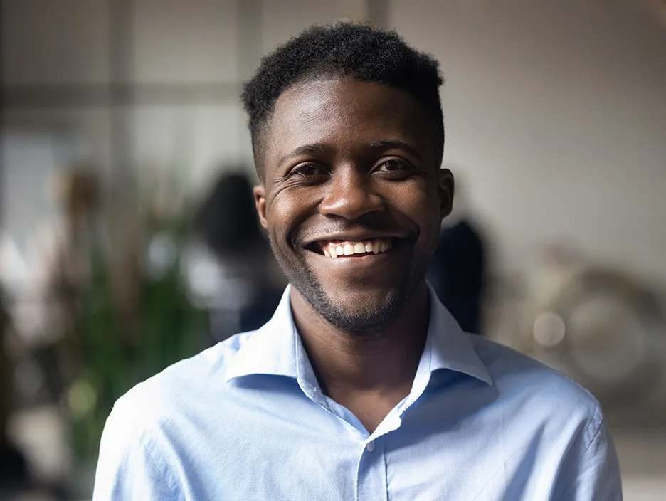 A confident happy man smiling