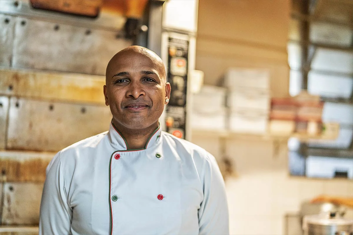 A chef cooking in a professional kitchen