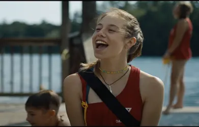 a lifeguard cheering people on