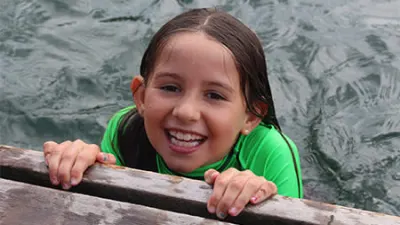 Girl Smiling on Dock