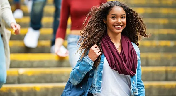 Girl walking and smiling