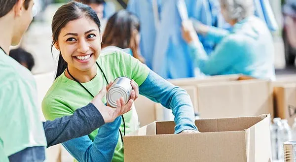 Volunteer girl smiling